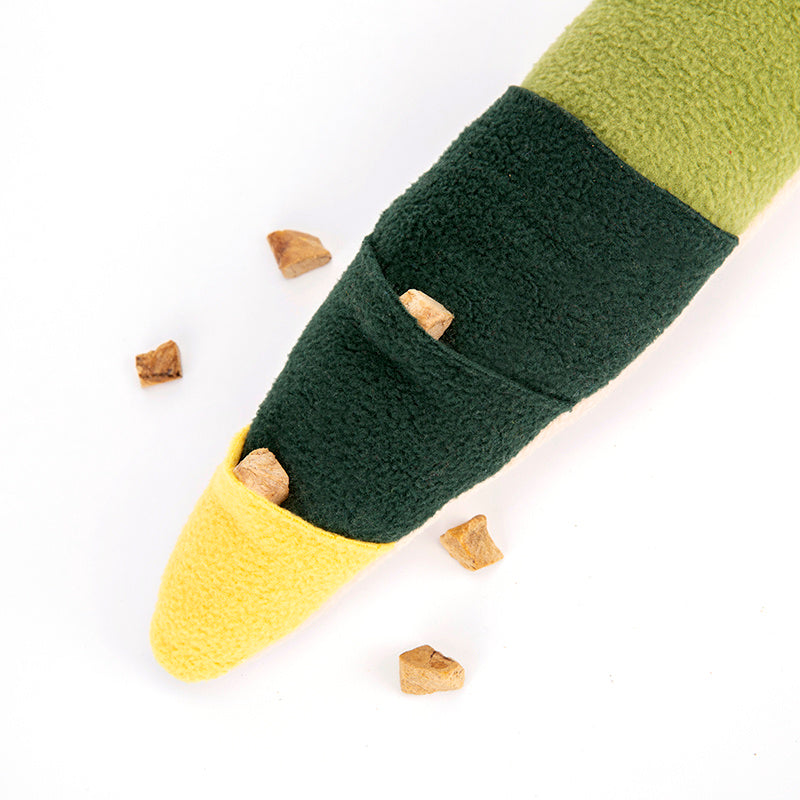 Green and yellow fabric with wooden beads on a white background