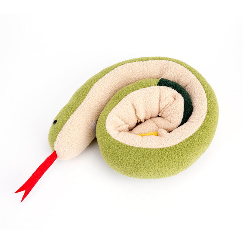 Toy snake with green body, beige head and belly, and red tongue on a white background