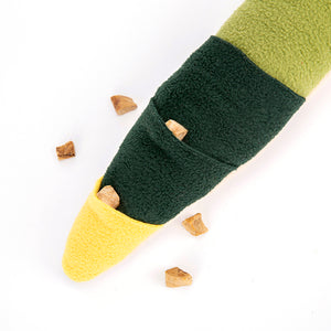 Green and yellow fabric with wooden beads on a white background