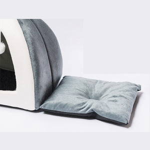 Gray pet bed with a cushion on a white background