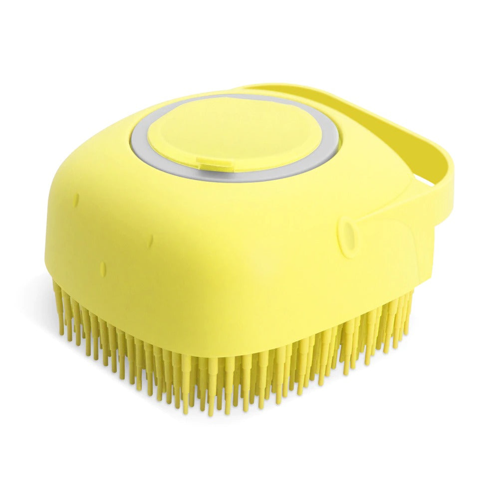 Yellow scalp massager on a white background