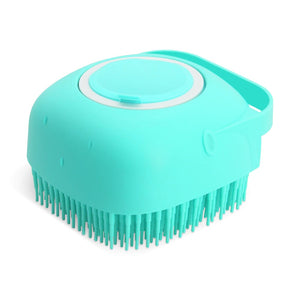 Turquoise silicone scrubber with bristles on a white background