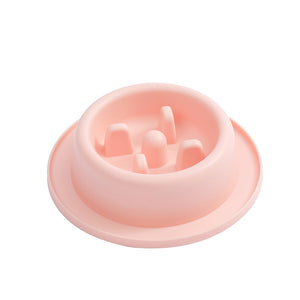 Pink silicone lid with a central hole on a white background